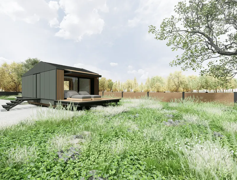 N8 Mini House in a garden with a meadow in bloom